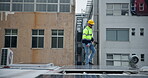 Man, engineer and solar panel on inspection in rooftop in city building for green energy, electricity and sustainability. Male person, electrician and technician with installation for  maintenance