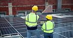 Solar panels, tablet and team of engineers on rooftop planning for renewable and sustainable energy. Collaboration, digital technology and industry workers for maintenance on photovoltaic electricity