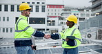 Employees, technician and solar panel with handshake at rooftop for partnership in green energy or electricity. People, electrician and engineer with installation for maintenance and  sustainability