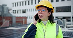 Building, city and phone call with construction worker woman outdoor on roof for communication or planning. Architecture, engineering and infrastructure with contractor in urban town for development