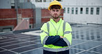 Crossed arms, sustainable and engineer by solar panels for eco friendly or renewable energy planning. Serious, pride and portrait of man PV installer on rooftop with photovoltaic electricity cells.