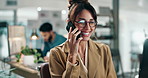 Woman, glasses and phone call for talking in office, funny conversation and laugh for humor. Female person, coworking space and laptop reflection for client negotiation, joke and app for speaking