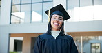 Happy woman, graduation and robe with confidence at university in education, learning or milestone at campus. Portrait of female person, graduate or student with smile for future, wisdom or knowledge