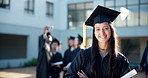 Happy woman, student and graduation with certificate at university for education, learning or qualification at campus. Portrait of female person, graduate or student smile for degree or scholarship