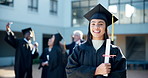 Happy woman, graduation and robe with certificate at university for education, learning or qualification at campus. Portrait of female person, graduate or student with smile for degree or scholarship