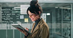 Woman, tablet and finance in night at office with reading, charts or stats for profit, budget or audit. Person, accountant and touchscreen on fintech app for review, reading or planning in workplace