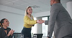 Business people, applause and handshake for collaboration, celebration and success together in office. Executive, diversity and shaking hands for achievement, contract and thank you with client deal