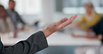 Business people, hand and woman in meeting, speech and speaker with feedback, proposal and gesture. Group, closeup and person with ideas, seminar and seo with conversation and presentation in office