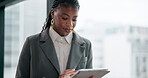 Black woman, intern and online with tablet in project management, administration and progress report. Female person, technology and reading for opportunity, career and company news at office or work