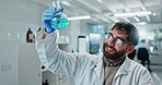 Scientist, man and liquid in beaker in laboratory with microscope for chemistry experiment and medical research. Science analysis, expert or chemical inspection for pharmaceutical study or virus cure