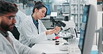 Scientist, woman and label test tube with blood in laboratory for healthcare, pathology and dna testing. Biotech, expert and fluid sample for medical research and phlebotomy results in pharma company