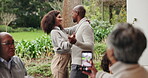 Couple, dancing and fun for reunion, outdoor and video for memory of love in anniversary and family. Videography, cellphone and gathering in nature, travel and commitment in marriage, smile and care