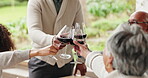 Wine, family and toast with drinks at thanksgiving dinner, outdoor table or happiness for gathering in home. People, celebration and party with alcohol, festive and cozy on holiday, vacation or event