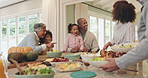 Big family, lunch and home with kids, grandparents and parents with thanksgiving and holiday food. Dining room, reunion and conversation with meal, dish and brunch with happy grandmother at buffet