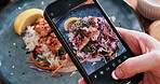 Food, phone or hand at restaurant for photography, social media or update in travel journal from above. Person, influencer or healthy meal at bistro for blog, post or online cafe review for followers