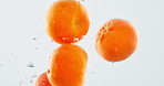 Fruit, orange and vitamin c with water splash for diet, nutrition or fresh produce in studio on a white background. Closeup of juicy, citric acid or hydration of natural organic food on healthy detox