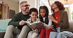 Parents, relax and reading book on sofa with children for family bonding, engagement and storytelling for language development. Mom, dad and happy with kids in home for literacy and cognitive growth.