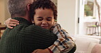 Family, child or running to dad for hug, happy or affection in home. Father, young boy and embrace in living room for love, trust or appreciation for adoption with relationship development or support