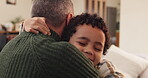 Family, child and dad in home for hug, happy and affection in living room. Father, young boy and embrace at sofa for love, trust or appreciation for adoption with relationship development or support