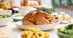 Food, dinner and party with chicken and table setting, celebration and holiday with Christmas or thanksgiving. Social event, gathering and brunch, turkey and lunch with gourmet meal, festive or feast