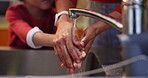 Mother, child and washing hands for hygiene, health or care in home for virus, infection and prevention. Parent, kid and cleaning ritual with water, sink and tap in house for bacteria, germs and dirt