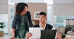 Business, people and documents with laptop in office for financial planning, budget report and payroll advice. Woman, man and meeting of paperwork for finance information, salary analysis and project