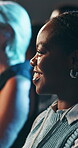 Conference, audience and woman listening with smile for corporate training, workshop and information. Happy, person and crowd at business summit for presentation, feedback and learning at company