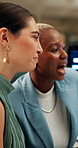 Night, business people and man with computer, teamwork and brainstorming with planning. Women, evening and employees with pc, internet or choice with decision, deadline and inspiration for project