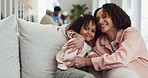 Mother, daughter and face for hug in home, love and affection for support in bonding. Mom, girl and portrait for connection in embrace, trust kiss and kid for security in relationship or happiness