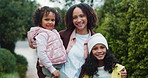 Happy, nature and face of children with mother in national park for winter holiday, getaway or adventure. Smile, love and portrait of kids with mom in outdoor field for weekend trip in Colombia.