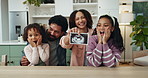 Family, ultrasound and pregnancy announcement in home with celebration, wow and happy for good news. Parents, children and surprise in house with smile for pregnant woman, mother and gender reveal