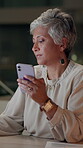 Mature woman, smartphone and typing for internet, website and online application in office at night. Manager, mobile and sign up for project management app, email and kpi tools in workplace with info