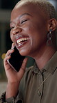 Black woman, happy and phone call for conversation, social network and business joke in office at night. Employee, laughing and mobile communication for gossip, good news and networking in workplace