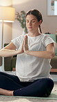 Pregnant woman, calm and meditation on floor in home for mindfulness, emotional balance and stress relief. Girl, eyes closed and praying hands for breathwork, prenatal yoga and maternity wellness.