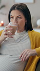 Woman, pregnant and smile with tea at home for diet or nutrition on maternity break and relax. Female person, mother and satisfied with healthy drink to boost immune system for health and wellness