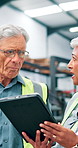 Mature, people and conversation with tablet in factory for design review, inspection results and compliance report. Managers, robotics facility and online for technical manual or system configuration