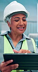 Tablet, talking and mature woman engineer in factory for inventory management or planning. Checklist, logistics and speaking with person in industrial plant for automated manufacturing or production