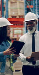 Walking, people and tablet for delivery in warehouse, talking and woman in logistics, inventory and cargo. Factory, check and discussion for supply chain, man and inspector with clipboard and storage