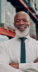 Face, confident and black man for logistics in warehouse, cargo inspection and project manager of production career. Portrait, mature worker and arms crossed, safety pride and shipping distribution