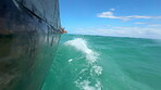 Boat, seascape and foam on ocean for travel, fishing and journey in sea. Horizon, research vessel and sailing in water for adventure, hobby and transport in Croatia with blue sky and waves for peace