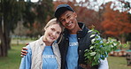 Nature, walking and face of volunteers with plant in park for community service, sustainability or gardening. Charity, hug and portrait of ngo team with leaves for eco friendly outreach project.