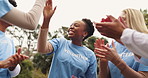 Applause, charity and volunteers in outdoor park with clapping hands for outreach program. Happy, clapping hands and ngo team cheering for community service partnership in nature for sustainability.