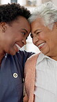 Senior person, nurse and hug for support with forehead touch in nursing home for retirement. Elderly woman, love and happiness in bonding with caregiver, connection and together in health or wellness