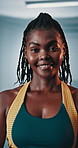 Black woman, face and confidence in club for exercise, strength or muscle building for fitness development. Commitment, portrait and happy African person smile for workout, training and challenge