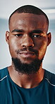 Black man, serious and confidence in gym for training, strength or muscle building for fitness club development. Commitment, portrait and African person face for workout, exercise and challenge