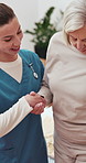 Holding hands, nurse and old woman with help, healthcare and wellness with physical therapy. Pensioner, senior person or medical with professional, caregiver or support with recovery, home or healing