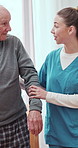 Holding hands, nurse and senior man with help, healthcare and wellness with healing. Pensioner, retirement or medical with professional, caregiver or support with recovery, home and physical therapy