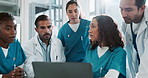 Laptop, doctors and nurses in healthcare for discussion, listening and planning for medical diagnosis. Teamwork, employees and technology in hospital for treatment ideas, feedback and surgery review