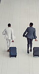 Business people, running and late for travel, flight and international networking event with luggage. Lawyers, hurry and top view for airport, stress and global convention, trip or airplane departure