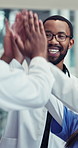 High five, doctors and man with team in hospital for collaboration, support and applause. Healthcare, clinic staff and happy men and women celebrate for medical service, wellness and insurance